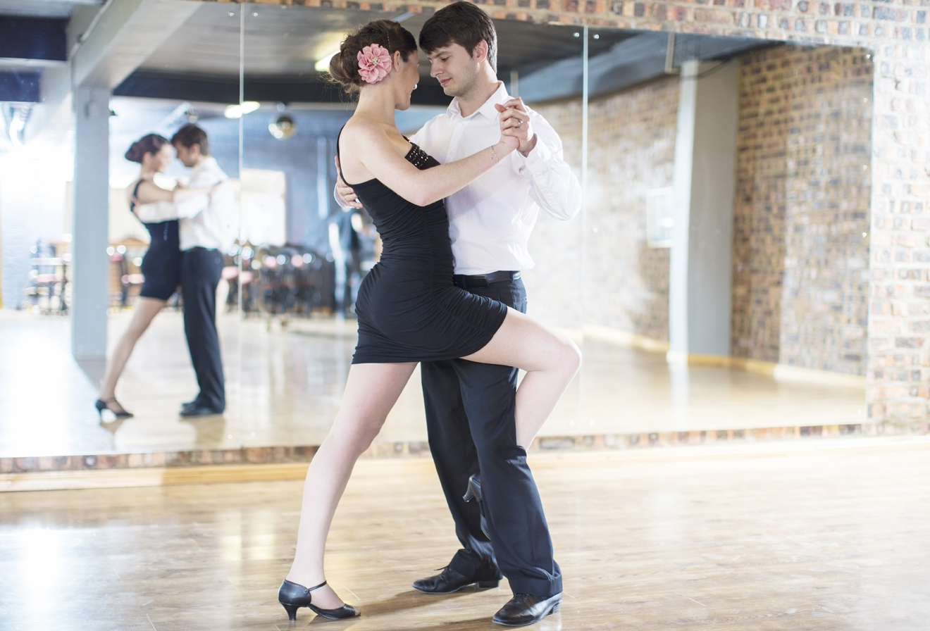 Couple enjoying a romantic dance lesson in Sarasota FL