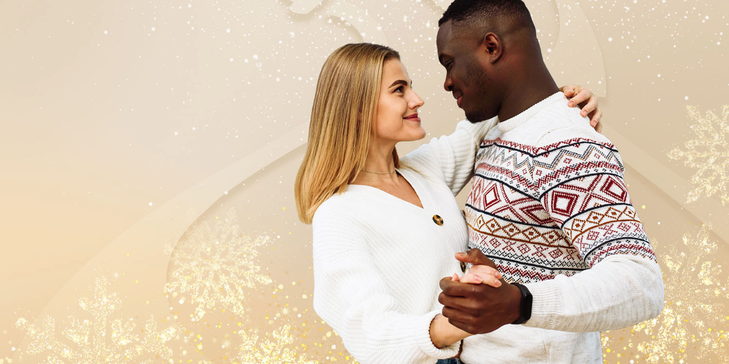 Young couple dancing together in Holiday